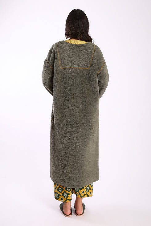 Long coat in faux fur with pockets